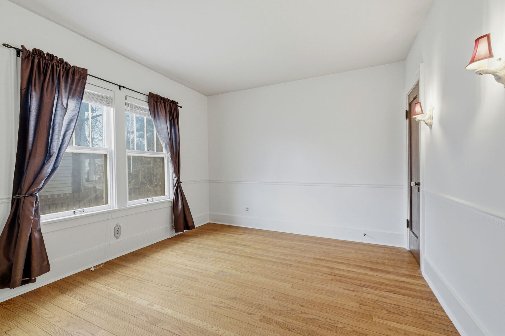 111 Oak Street Frankfort, IL 60423 - Photo 15 of 36 a view of an empty room with wooden floor and a window