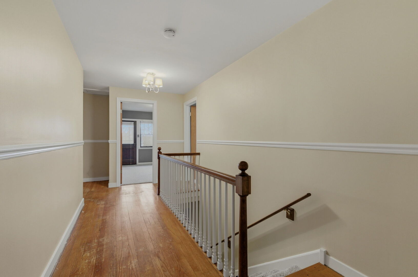 111 Oak Street Frankfort, IL 60423 - Photo 18 of 36 a view of a hallway with wooden floor