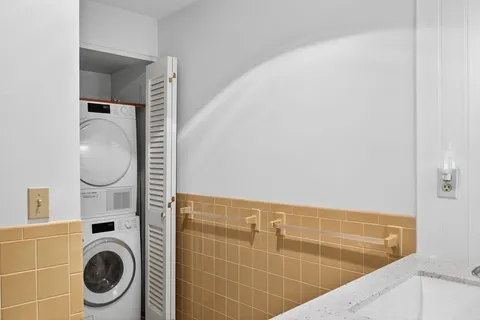 a bathroom with a toilet and a sink