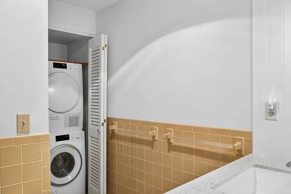 a bathroom with a toilet and a sink