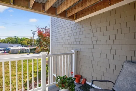 a view of a house with a potted plant