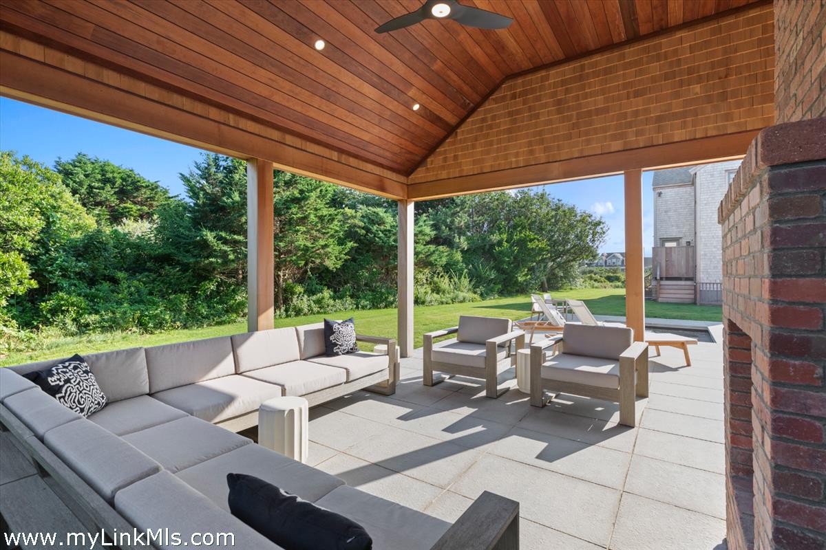 3 Tautemo Way Nantucket, MA 02554 - Photo 45 of 57 a patio with patio outdoor seating and mountain view