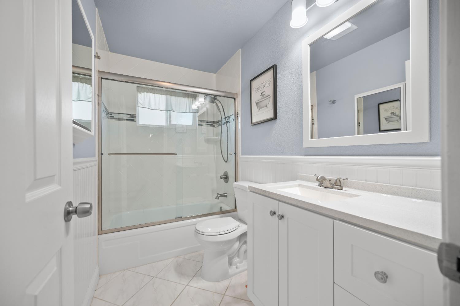 120 Eula Drive Modesto, CA 95354 - Photo 16 of 22 a bathroom with a sink a toilet and shower