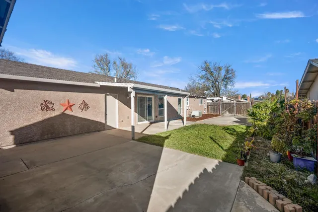 a house view with a garden space