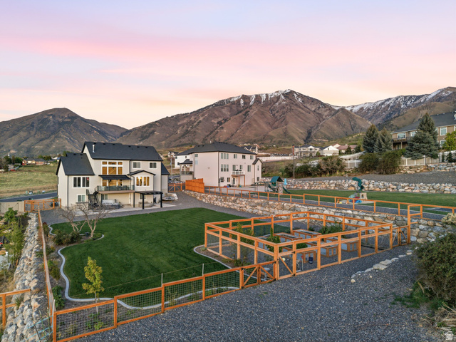 102 Elk Ridge Drive Elk Ridge, UT 84651 - Photo 55 of 61 View of community with a fenced backyard, a mountain view, and a residential view