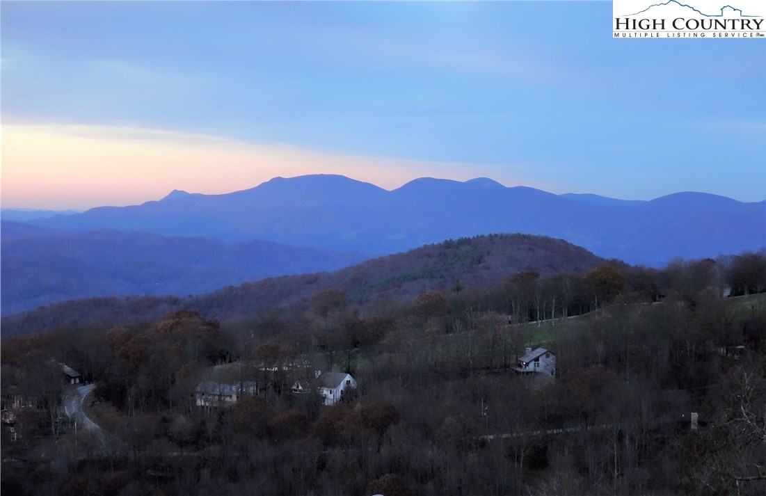 204 Pinnacle Ridge Road Beech Mountain, NC 28604 - Photo 14 of 50 a view of a town with mountains in the background