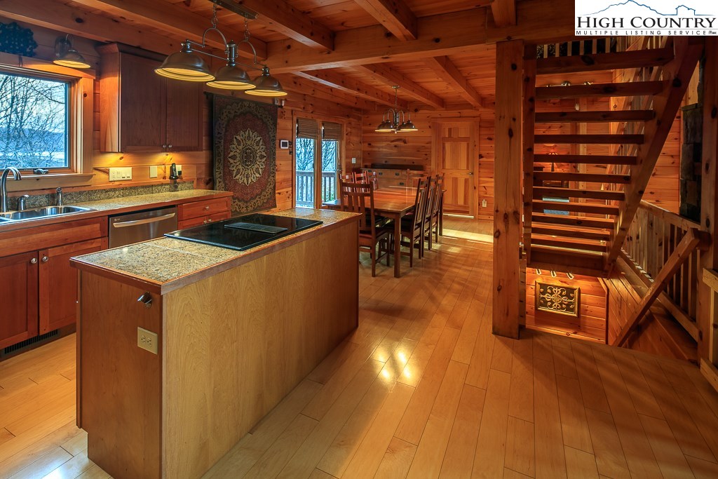 204 Pinnacle Ridge Road Beech Mountain, NC 28604 - Photo 17 of 50 a kitchen with a sink and cabinets