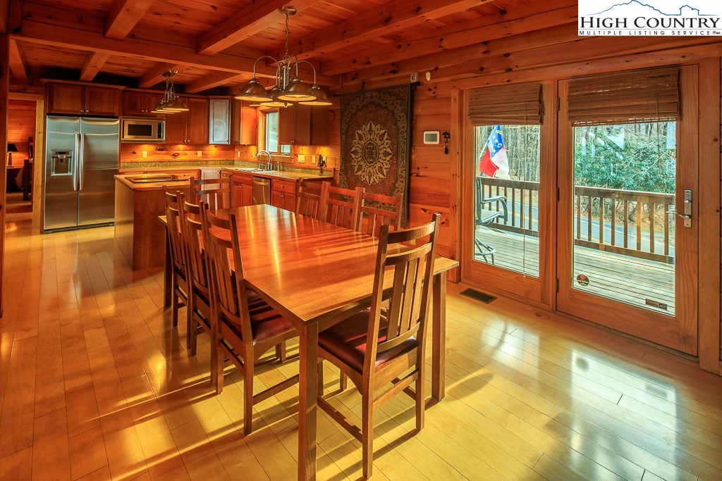 204 Pinnacle Ridge Road Beech Mountain, NC 28604 - Photo 20 of 50 a view of a patio with table and chairs