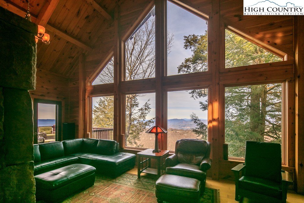 204 Pinnacle Ridge Road Beech Mountain, NC 28604 - Photo 3 of 50 a living room with furniture and a large window