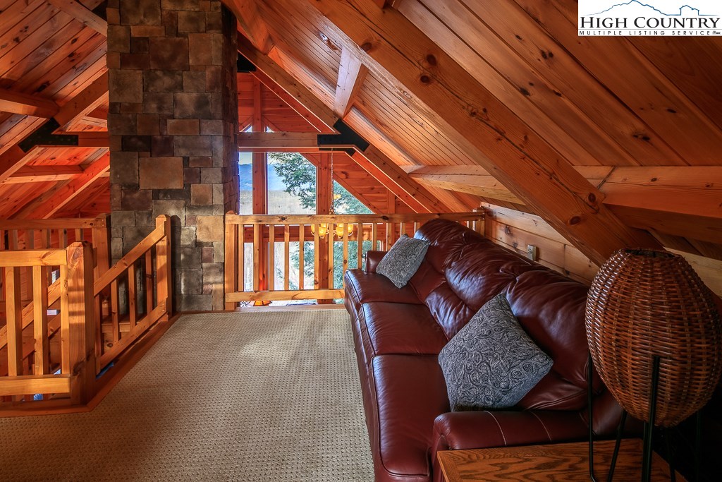 204 Pinnacle Ridge Road Beech Mountain, NC 28604 - Photo 34 of 50 a view of a porch with furniture
