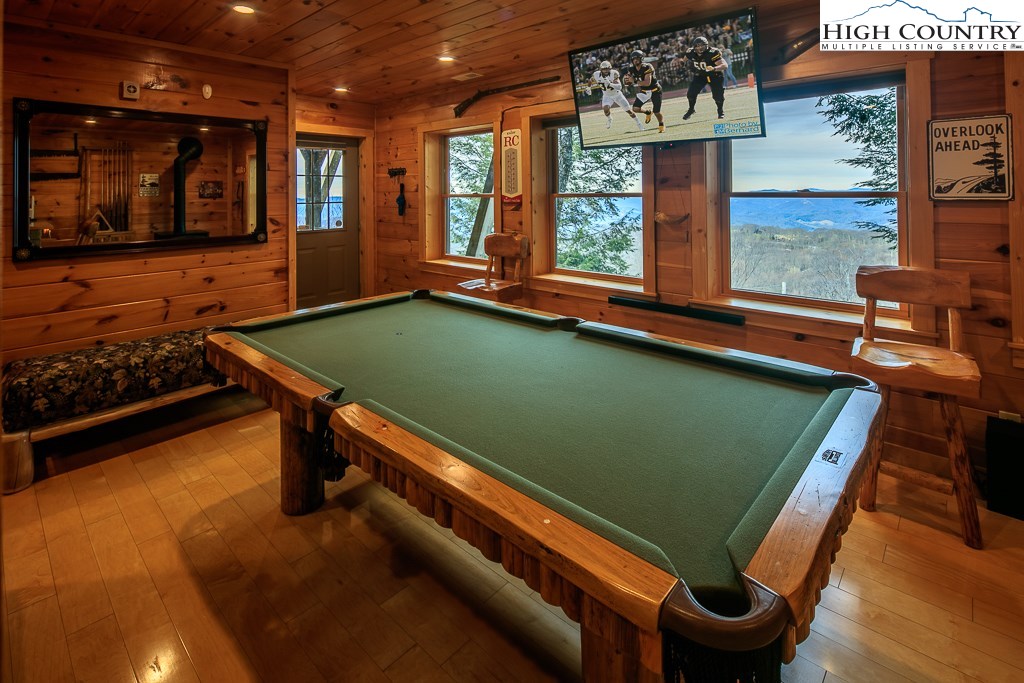 204 Pinnacle Ridge Road Beech Mountain, NC 28604 - Photo 37 of 50 a room with pool table and windows