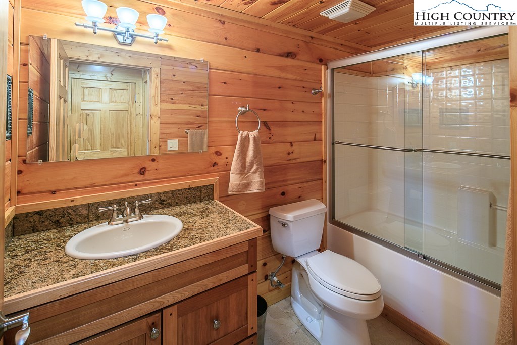 204 Pinnacle Ridge Road Beech Mountain, NC 28604 - Photo 39 of 50 a bathroom with a sink toilet and shower