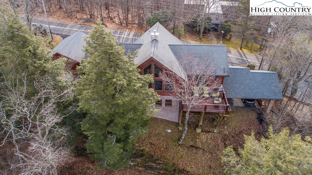204 Pinnacle Ridge Road Beech Mountain, NC 28604 - Photo 42 of 50 a aerial view of a house with yard and sitting area