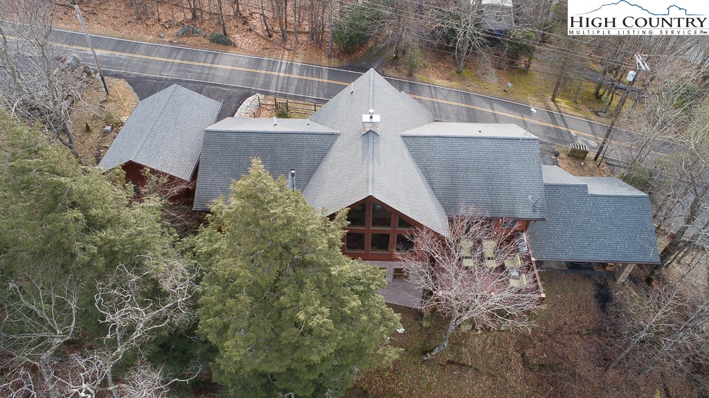 204 Pinnacle Ridge Road Beech Mountain, NC 28604 - Photo 45 of 50 an aerial view of a house with yard and outdoor seating