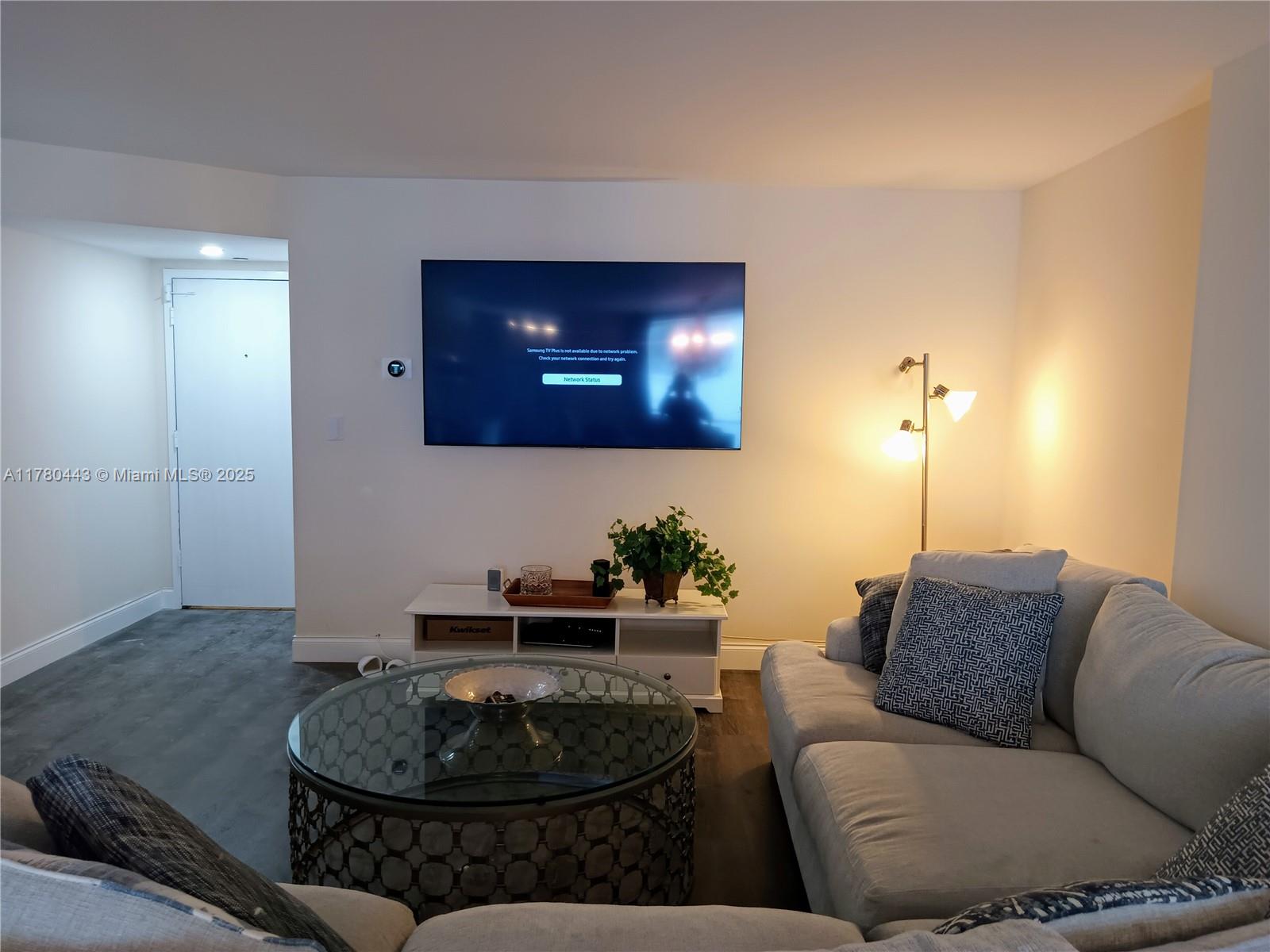 1000 South Ocean Boulevard, Unit 10E Pompano Beach, FL 33062 - Photo 17 of 64 a living room with furniture and a fireplace