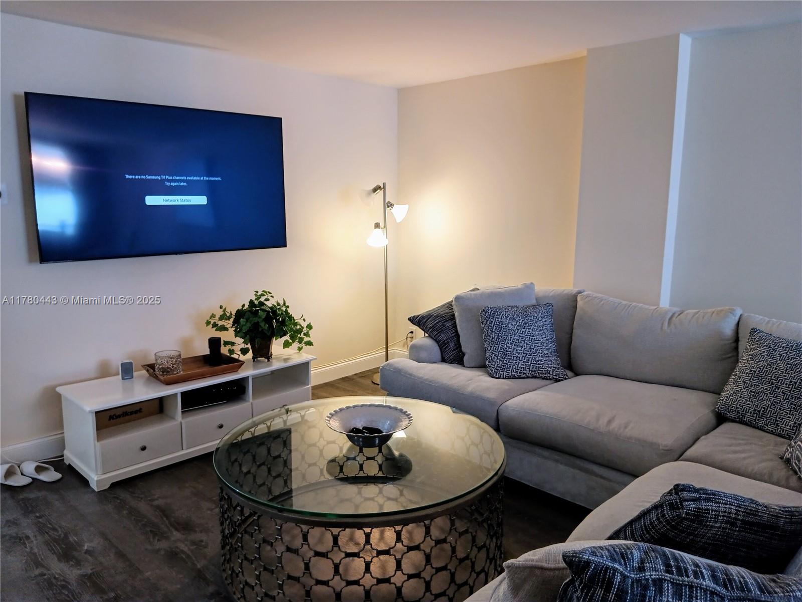 1000 South Ocean Boulevard, Unit 10E Pompano Beach, FL 33062 - Photo 18 of 64 a living room with furniture and a flat screen tv