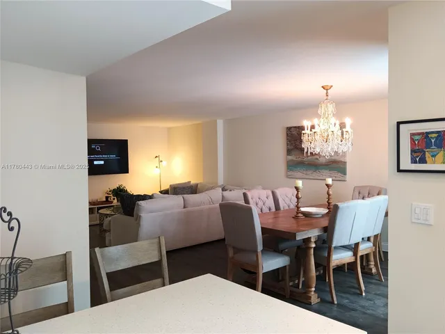 a kitchen with stainless steel appliances a refrigerator stove microwave and cabinets