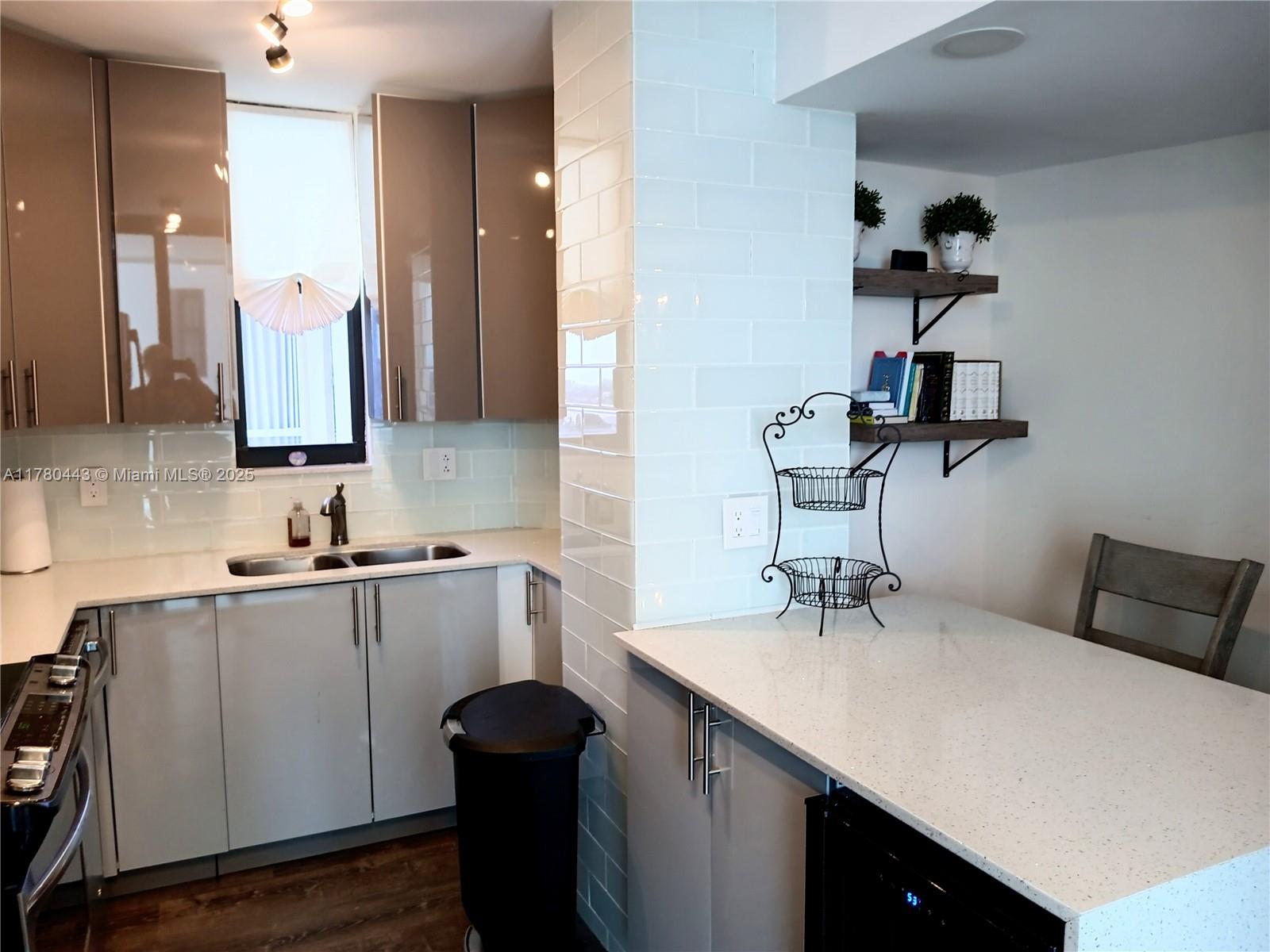 1000 South Ocean Boulevard, Unit 10E Pompano Beach, FL 33062 - Photo 29 of 64 a bathroom with a sink and a mirror
