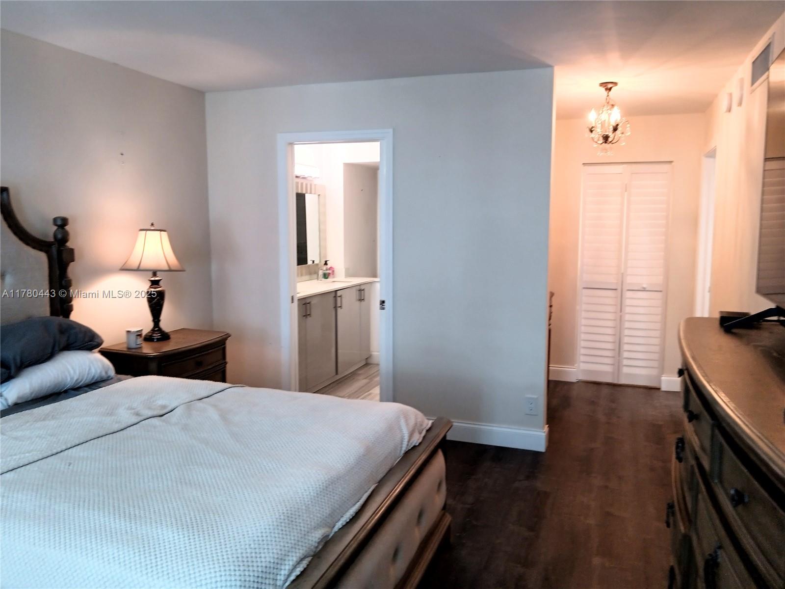 1000 South Ocean Boulevard, Unit 10E Pompano Beach, FL 33062 - Photo 58 of 64 a bedroom with a bed and a tv