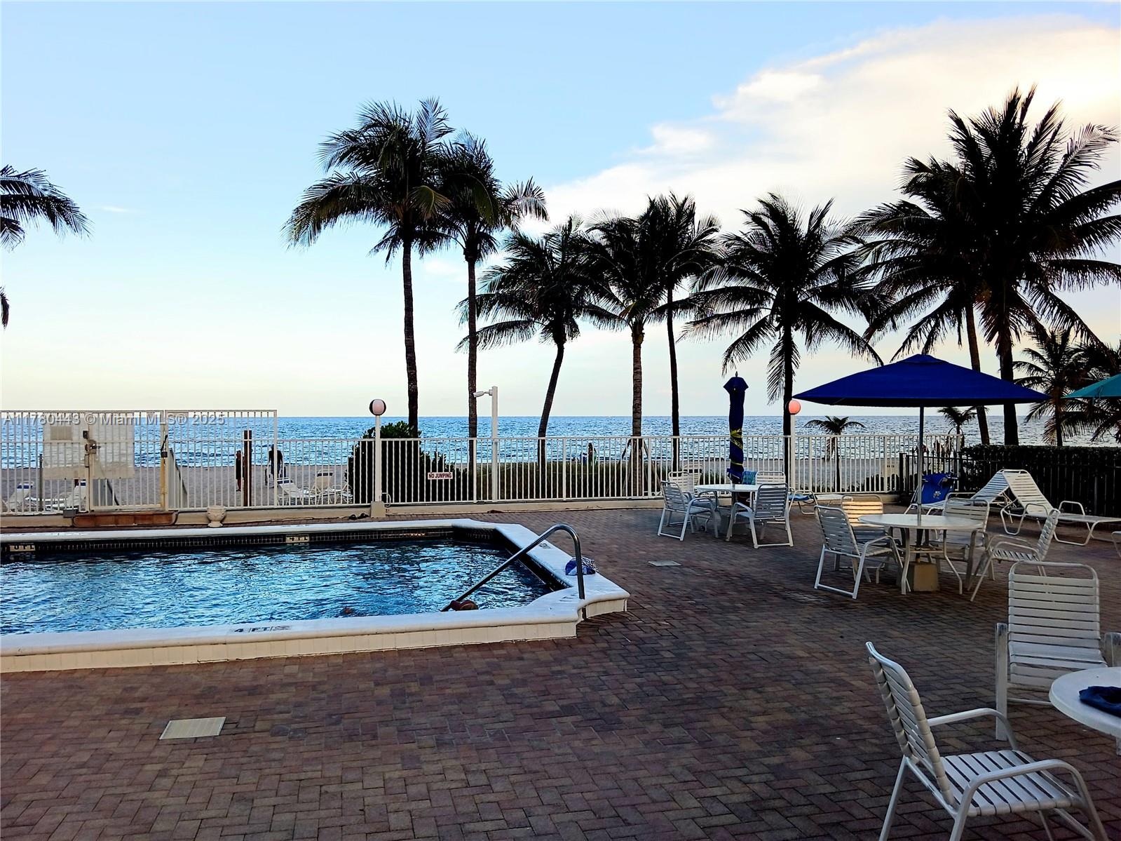 1000 South Ocean Boulevard, Unit 10E Pompano Beach, FL 33062 - Photo 9 of 64 a view of a backyard with furniture and a table