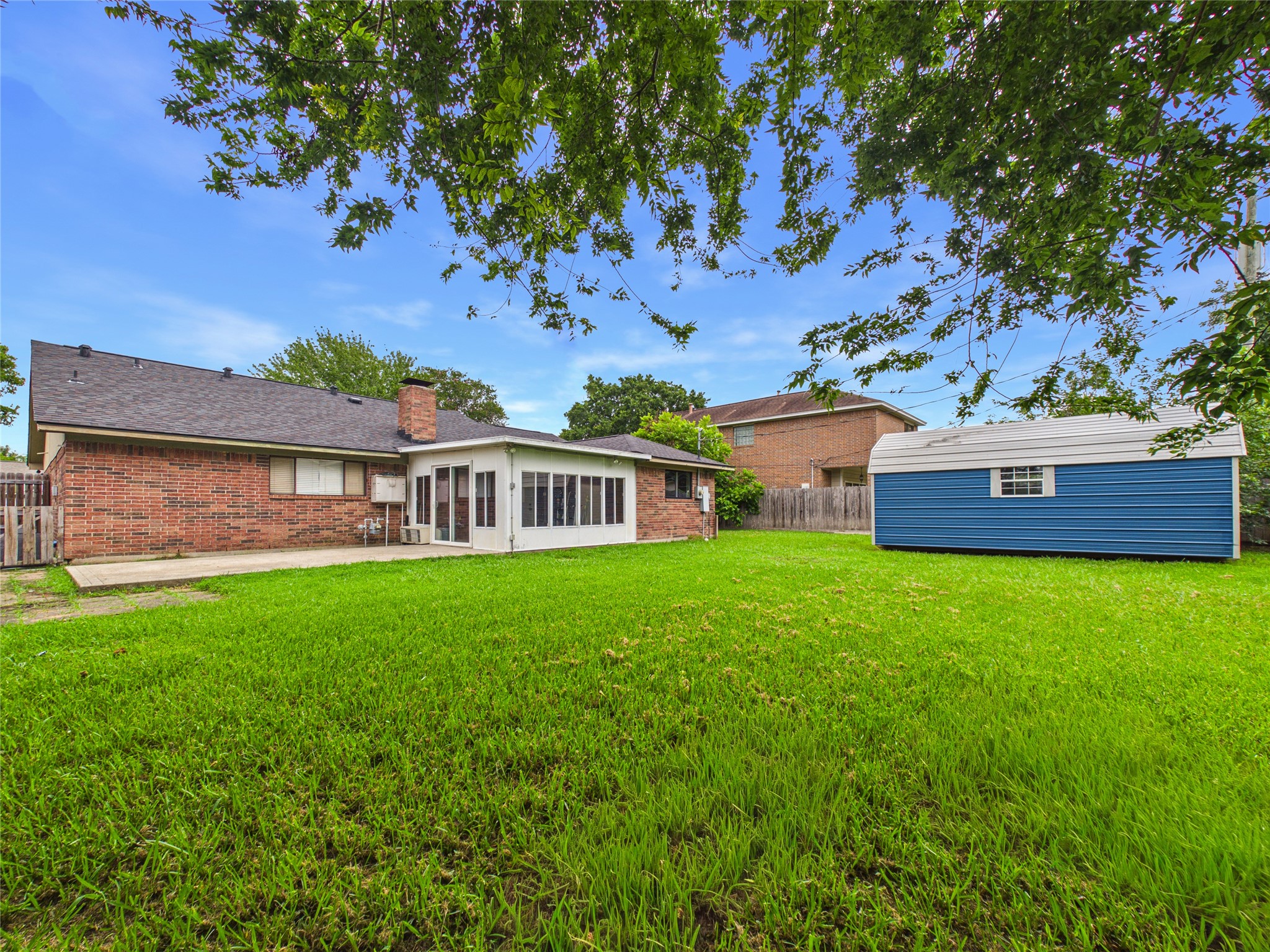 10306 Rustic Rock Road La Porte, TX 77571 - Photo 33 of 38 a view of a house with a yard
