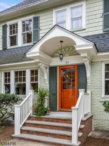 a front view of a house with a porch