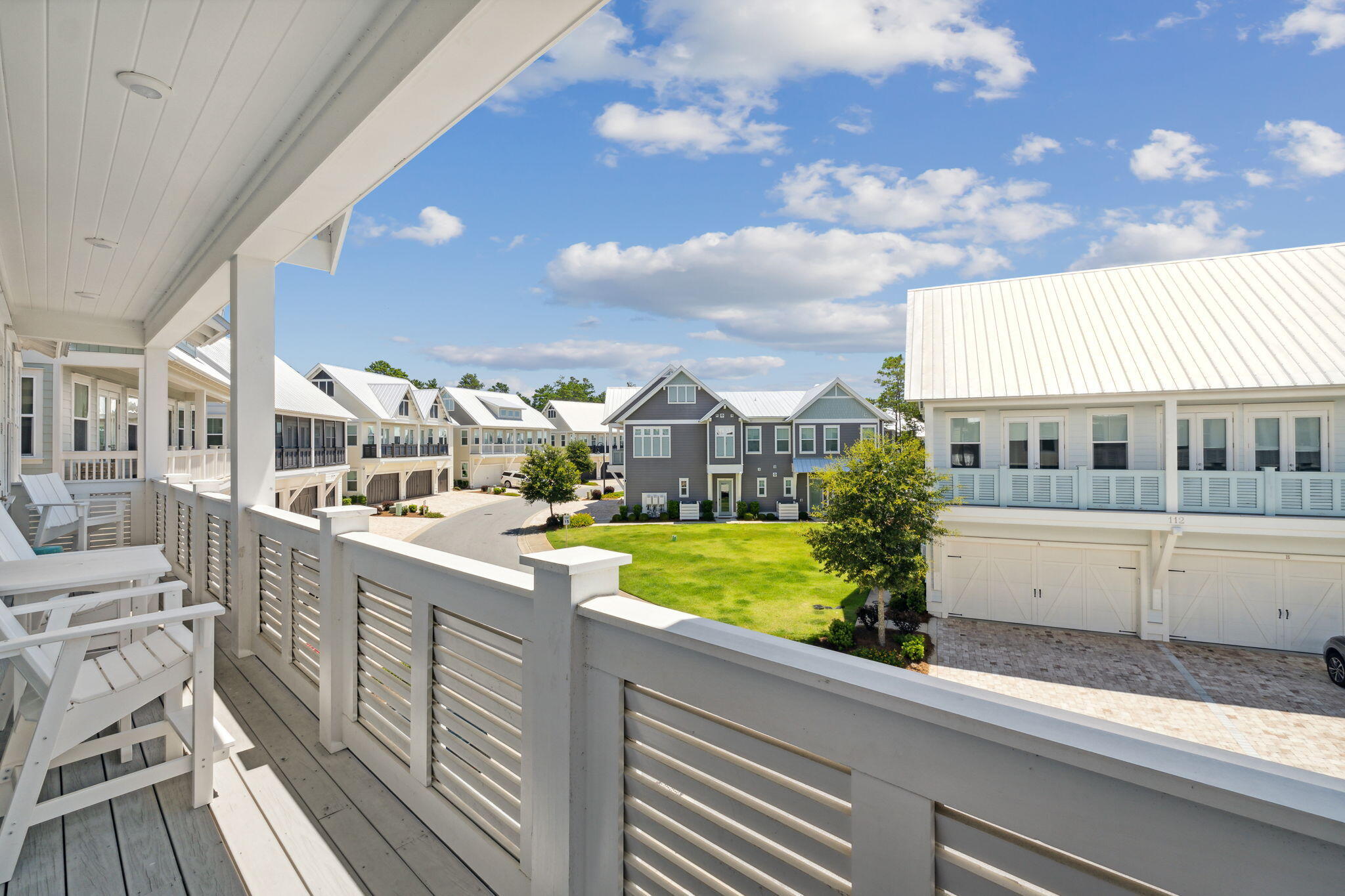 117 West W Pine, Unit C Inlet Beach, FL 32461 - Photo 22 of 45 a view of a house with a swimming pool