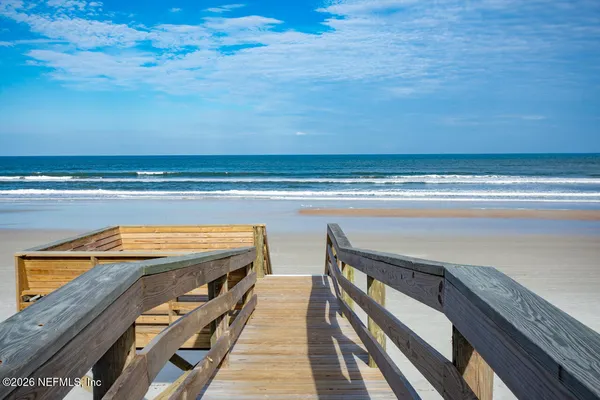 a car parked in front of a yard