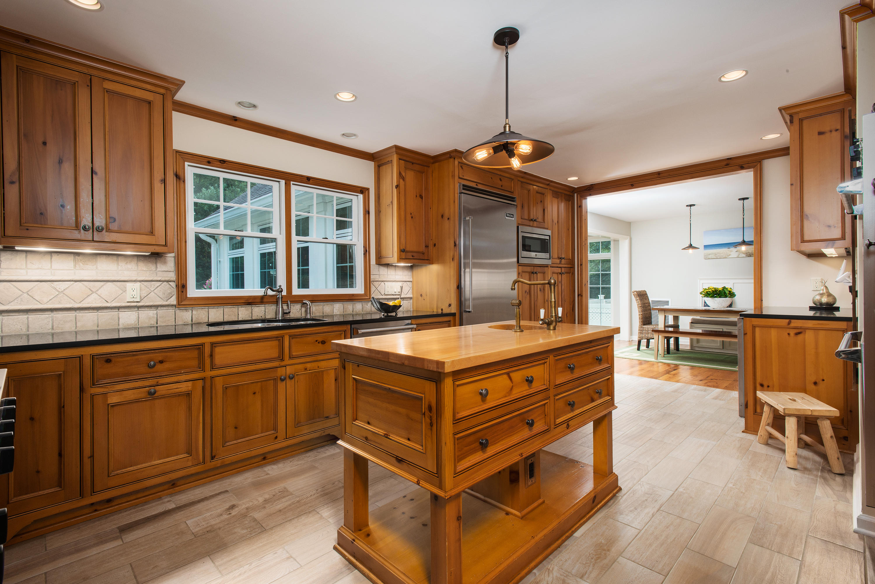 1381 Smith Ridge Road New Canaan, CT 06840 - Photo 11 of 35 a kitchen with stainless steel appliances granite countertop a stove and a sink