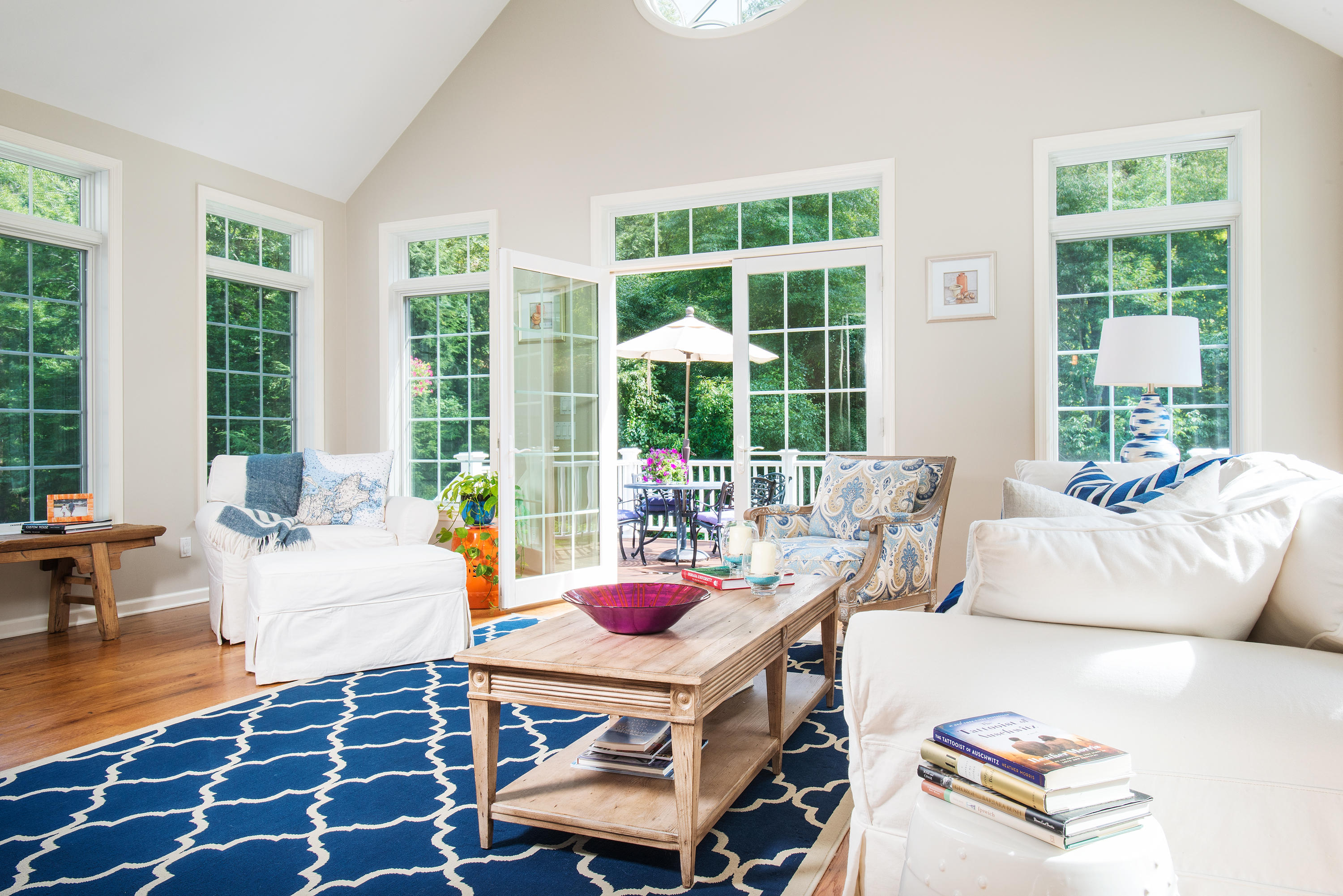 1381 Smith Ridge Road New Canaan, CT 06840 - Photo 15 of 35 a living room with furniture and a large window