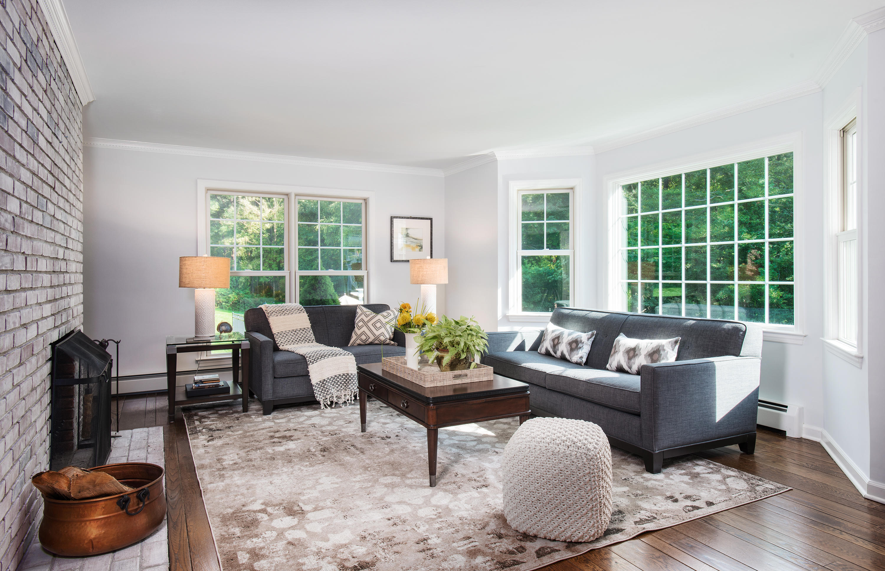 1381 Smith Ridge Road New Canaan, CT 06840 - Photo 16 of 35 a living room with furniture and a potted plant
