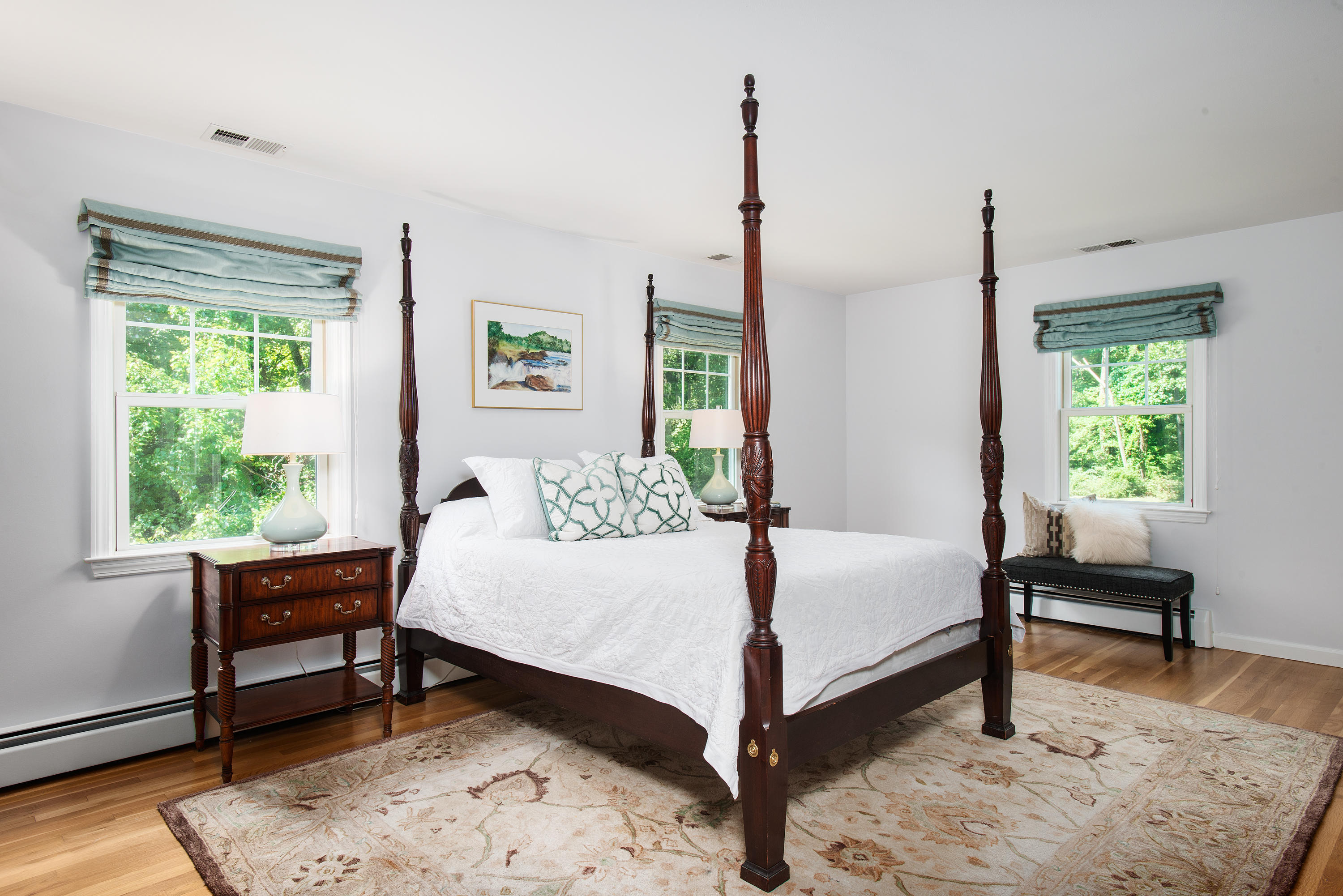 1381 Smith Ridge Road New Canaan, CT 06840 - Photo 19 of 35 a bedroom with a bed table and window