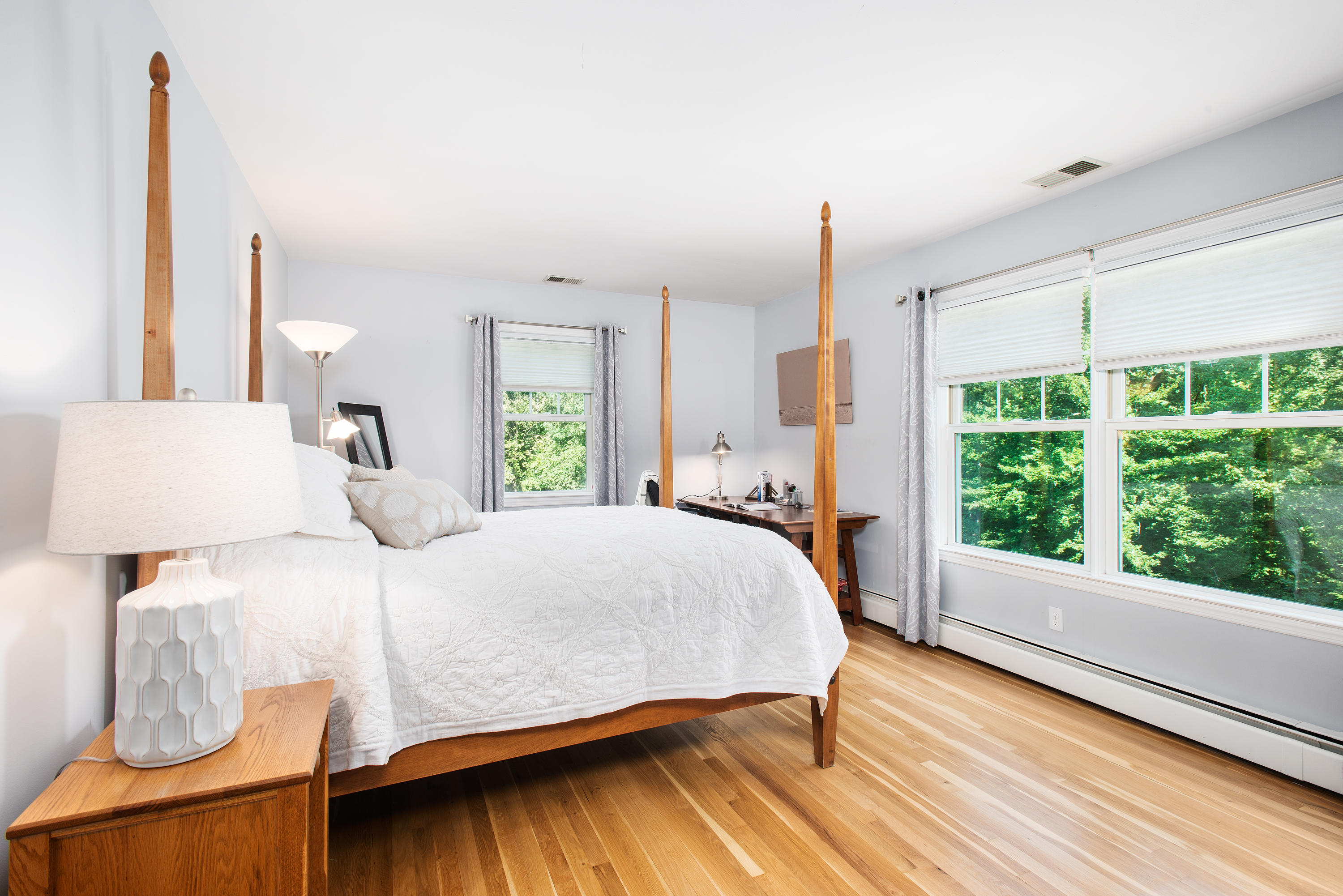 1381 Smith Ridge Road New Canaan, CT 06840 - Photo 21 of 35 a bedroom with a large bed and a window
