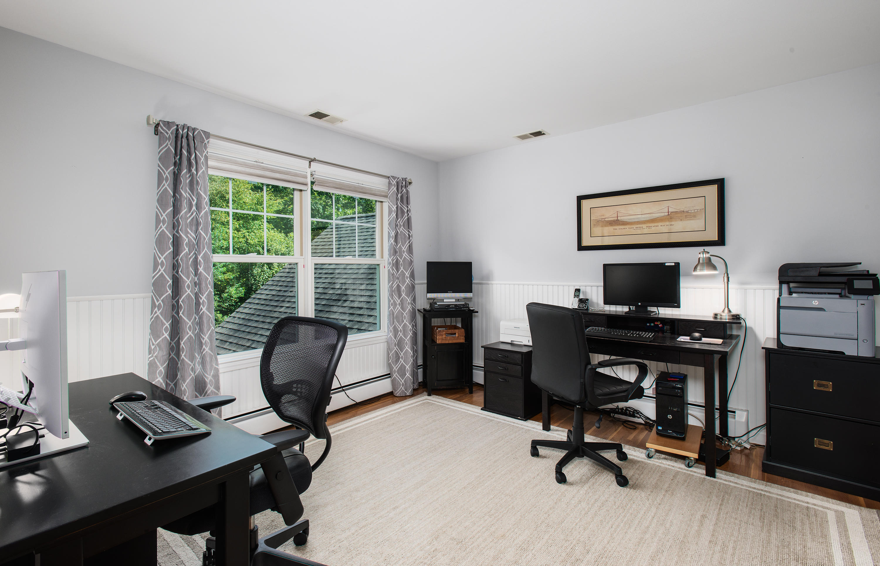 1381 Smith Ridge Road New Canaan, CT 06840 - Photo 22 of 35 a view of a workspace with furniture and a window