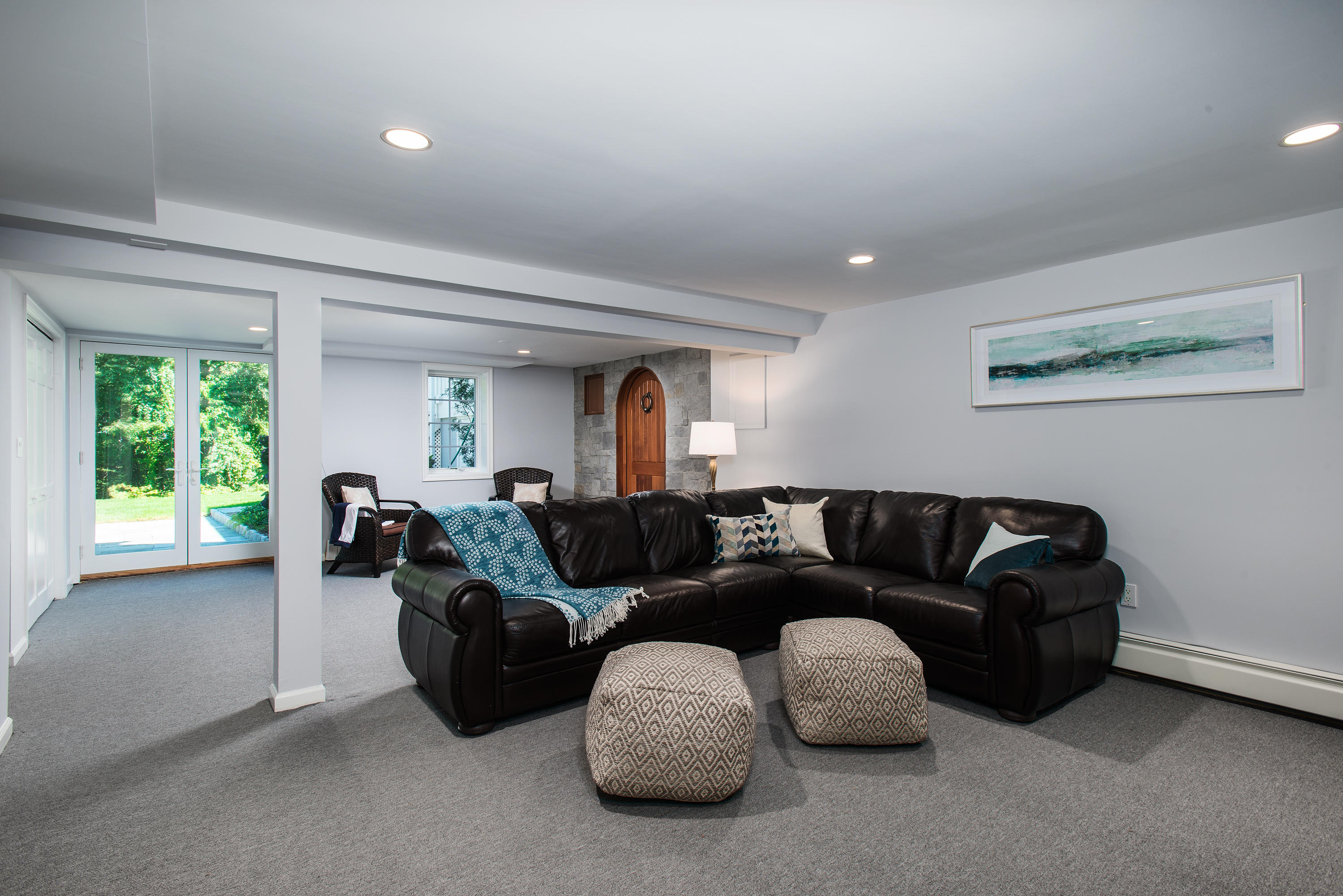 1381 Smith Ridge Road New Canaan, CT 06840 - Photo 23 of 35 a living room with furniture and a window