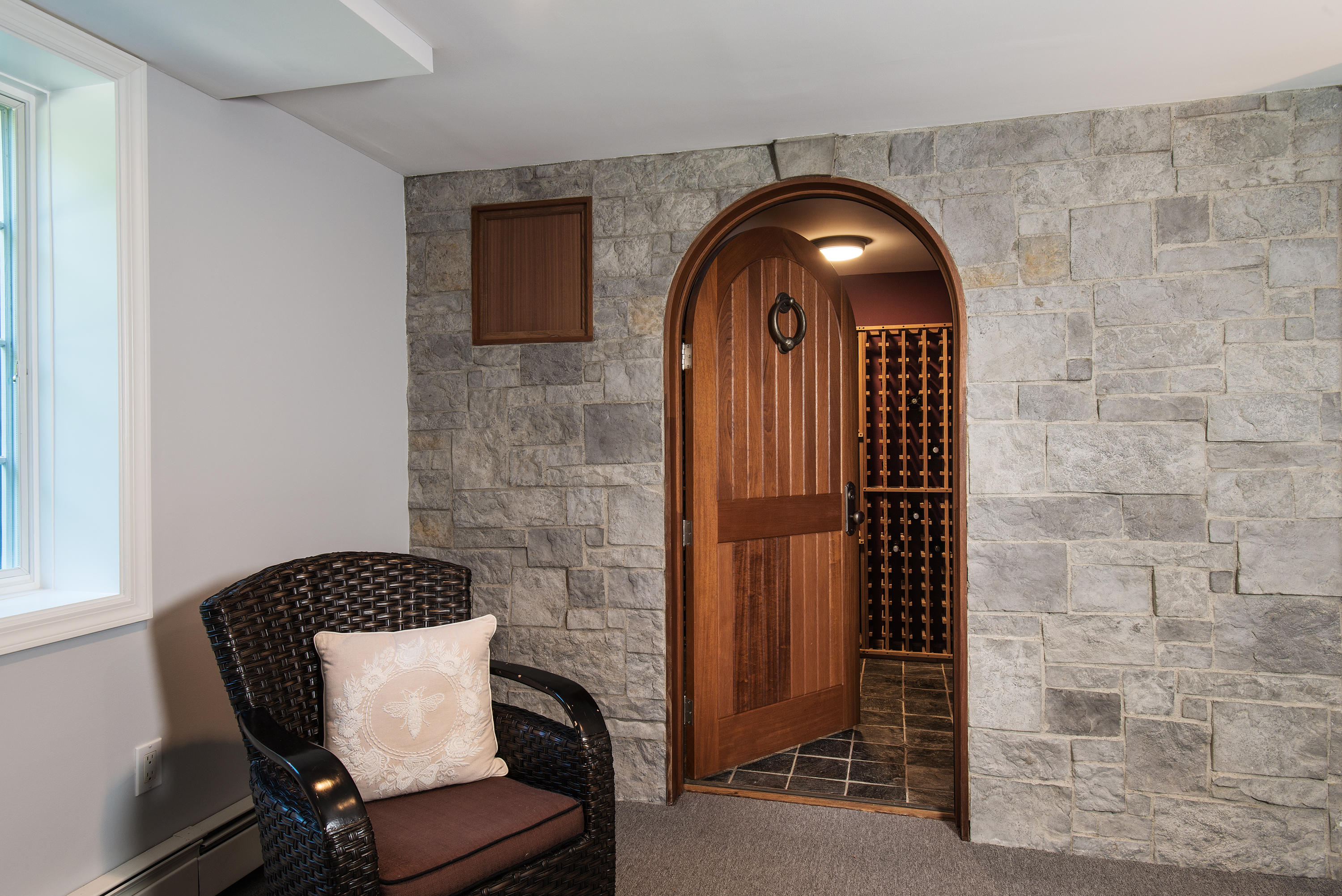 1381 Smith Ridge Road New Canaan, CT 06840 - Photo 25 of 35 a view of a door and chair in a room