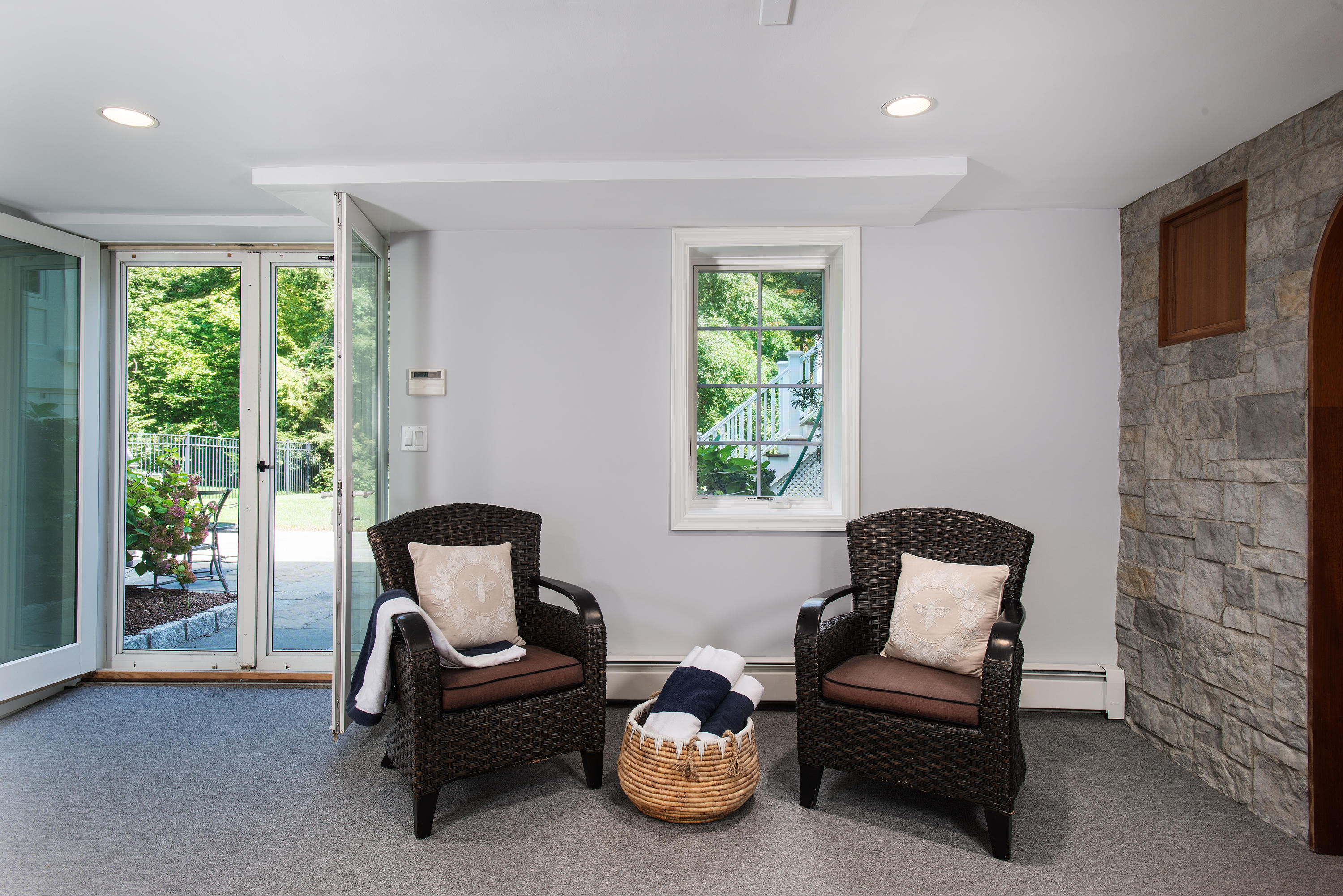 1381 Smith Ridge Road New Canaan, CT 06840 - Photo 26 of 35 a living room with furniture and a window