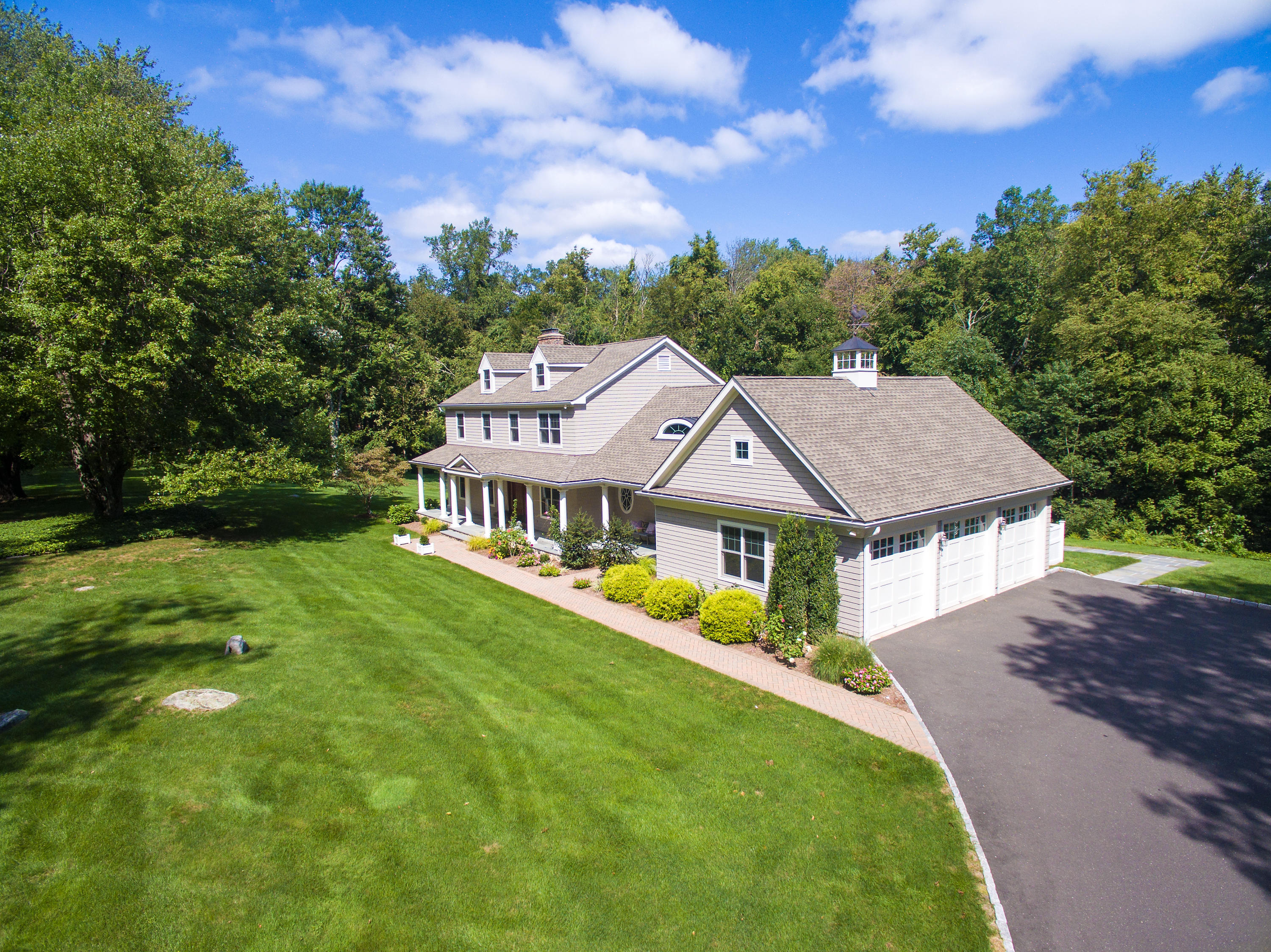 1381 Smith Ridge Road New Canaan, CT 06840 - Photo 35 of 35 a aerial view of a house with a big yard
