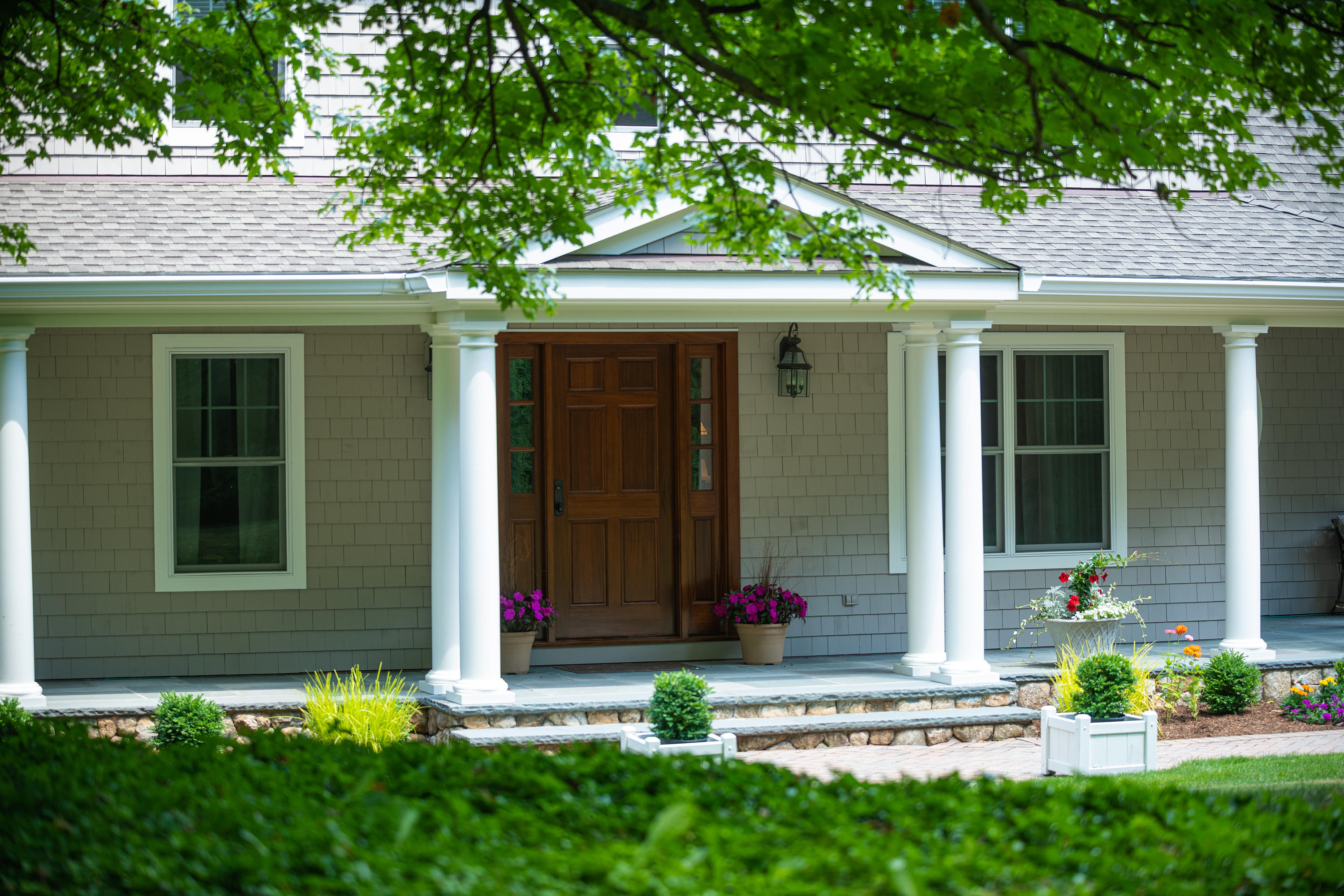 1381 Smith Ridge Road New Canaan, CT 06840 - Photo 7 of 35 front view of a house with a yard