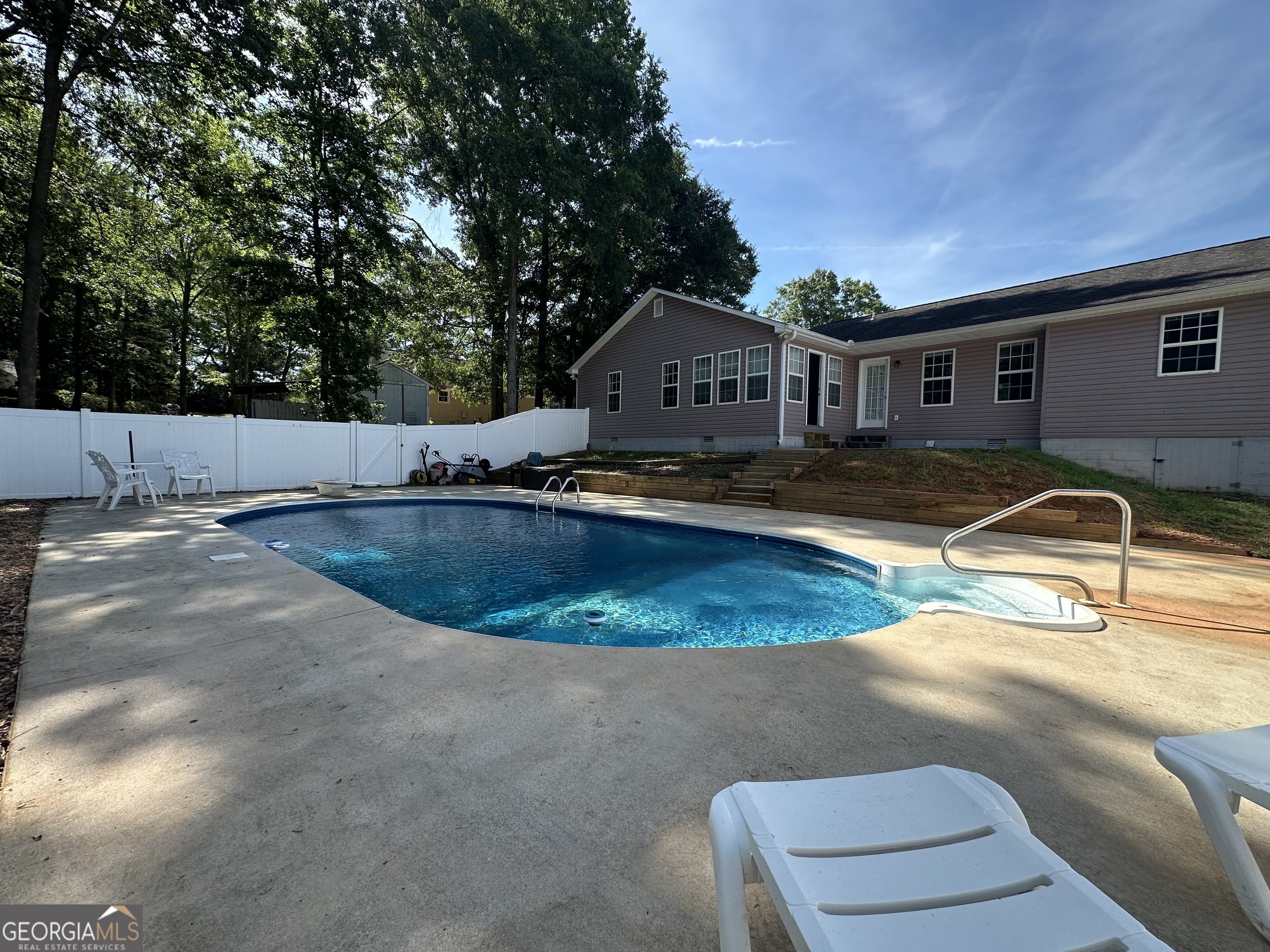 384 Sam Brown Boulevard Commerce, GA 30529 - Photo 17 of 25 a view of a house with pool