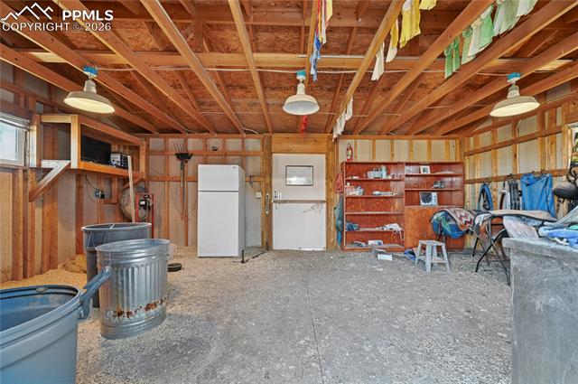 16830 Finch Road Colorado Springs, CO 80928 - Photo 44 of 49 Inside the 24' x 16' tack barn next to the riding arena