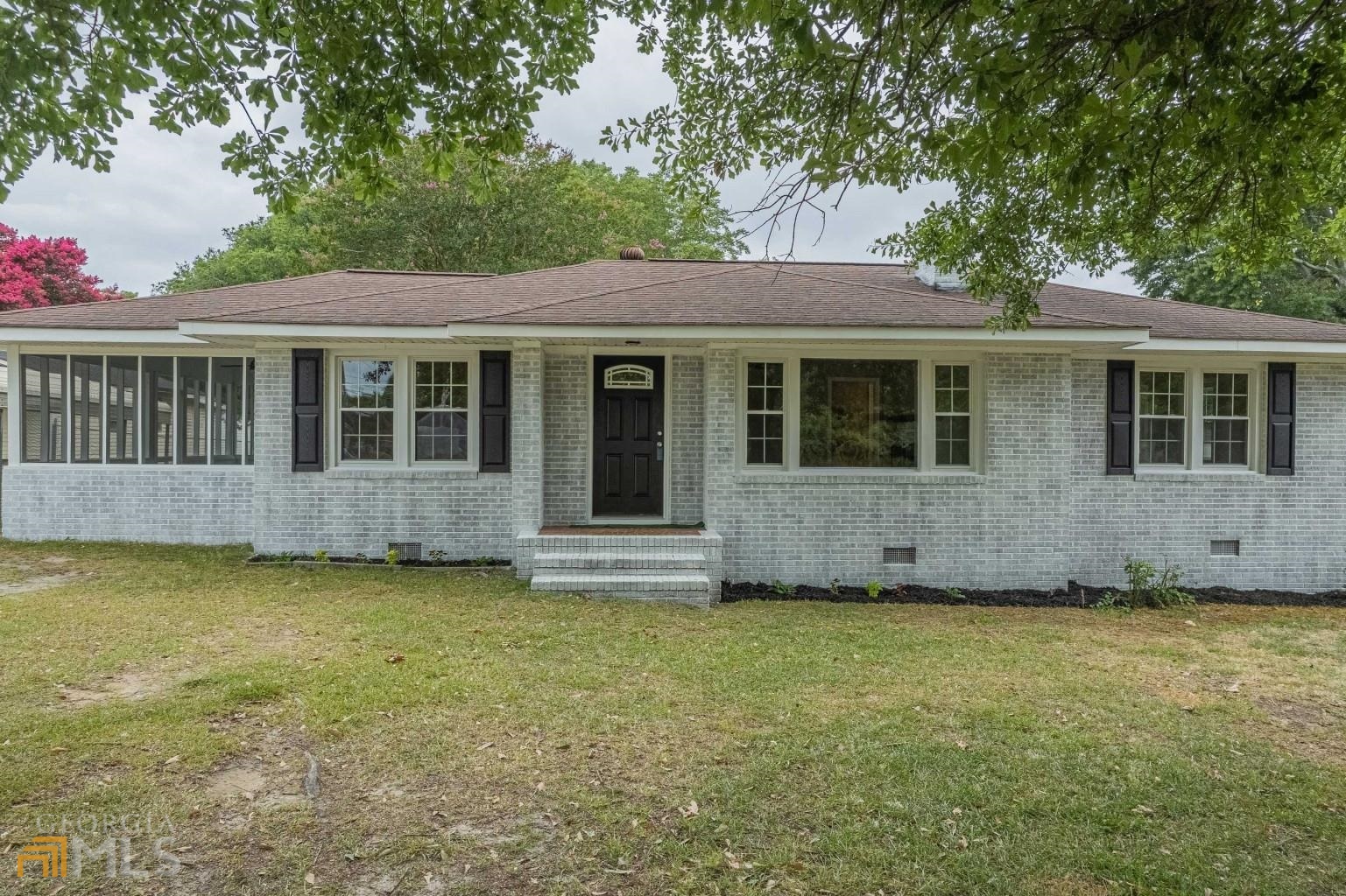 1207 Old Hartwell Road Elberton, GA 30635 - Photo 1 of 1 a view of a house with a garden