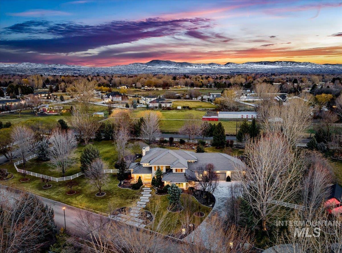1400 North Razza Way Eagle, ID 83616 - Photo 2 of 50 Aerial view at dusk of a mountain view