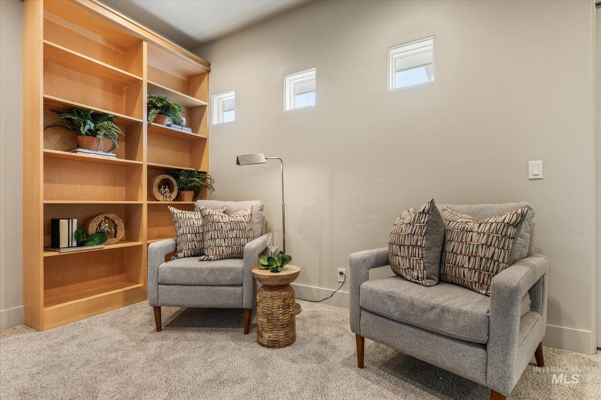 1400 North Razza Way Eagle, ID 83616 - Photo 35 of 50 Living area with baseboards and light carpet