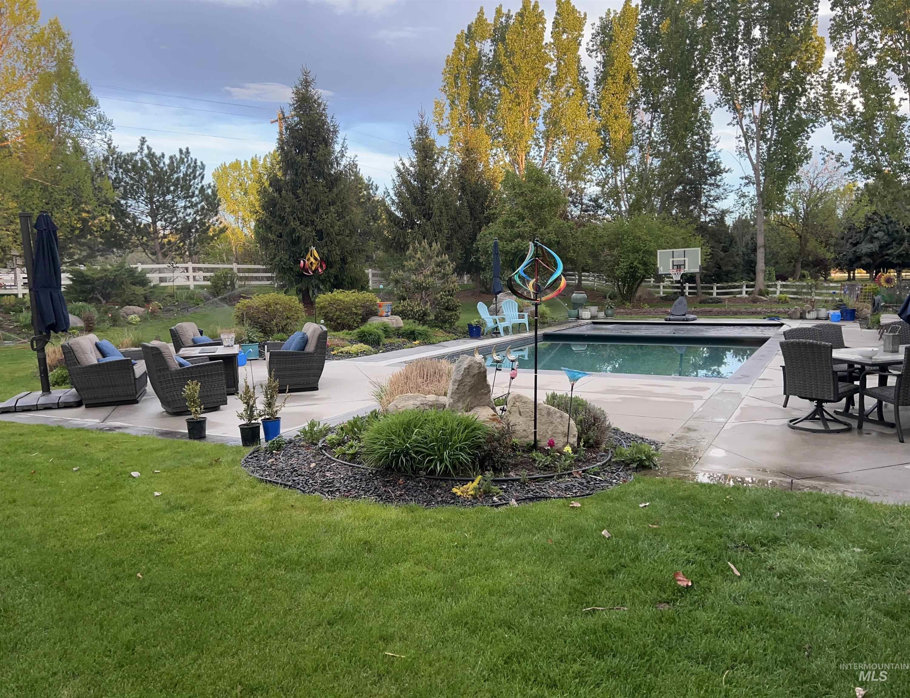 1400 North Razza Way Eagle, ID 83616 - Photo 4 of 50 Swimming pool with a patio area and outdoor lounge area