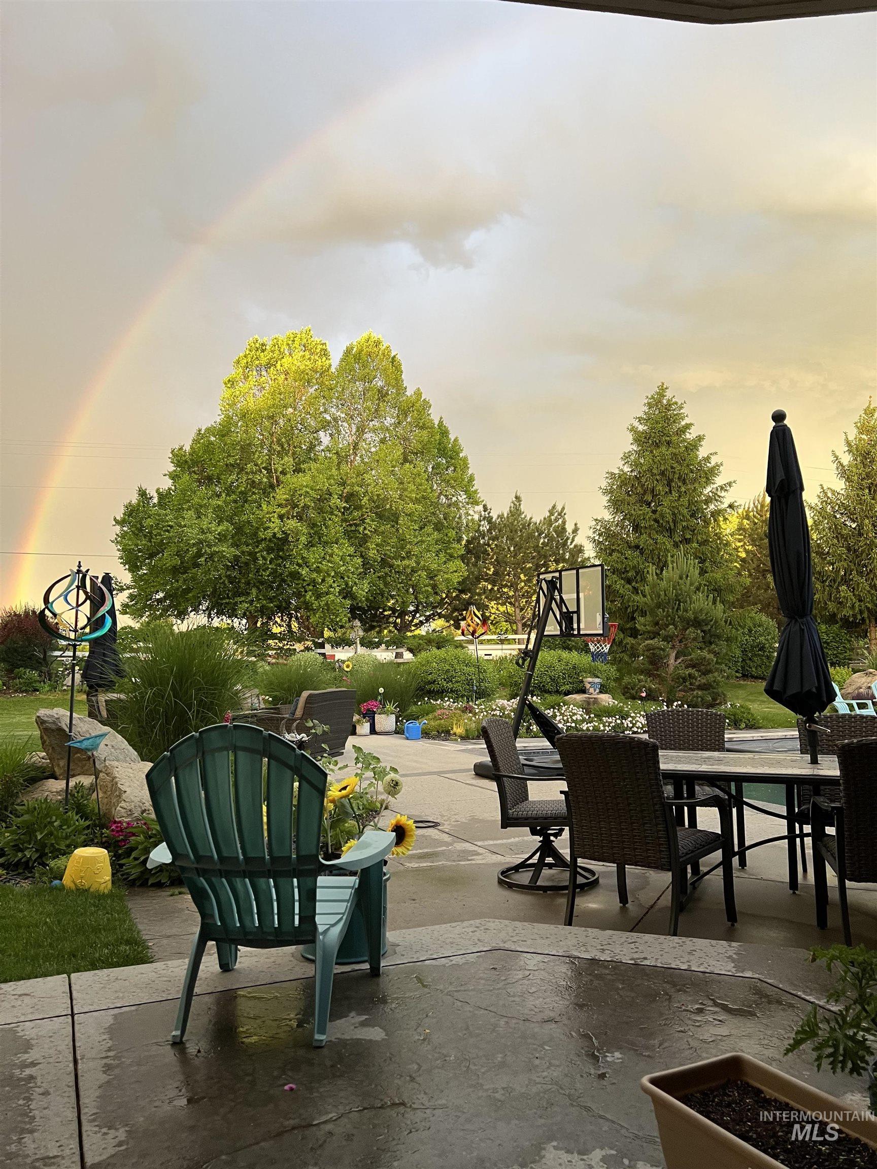 1400 North Razza Way Eagle, ID 83616 - Photo 8 of 50 View of home's community featuring a patio area and outdoor dining space