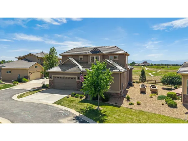 a picture of a house with a yard