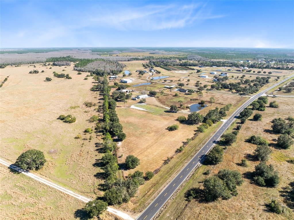 0 North Canoe Creek Road Kenansville, FL 34739 - Photo 5 of 8 an aerial view of beach and city