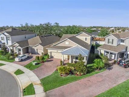 an aerial view of a city with lots of residential buildings