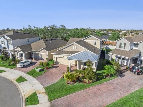 an aerial view of a city with lots of residential buildings